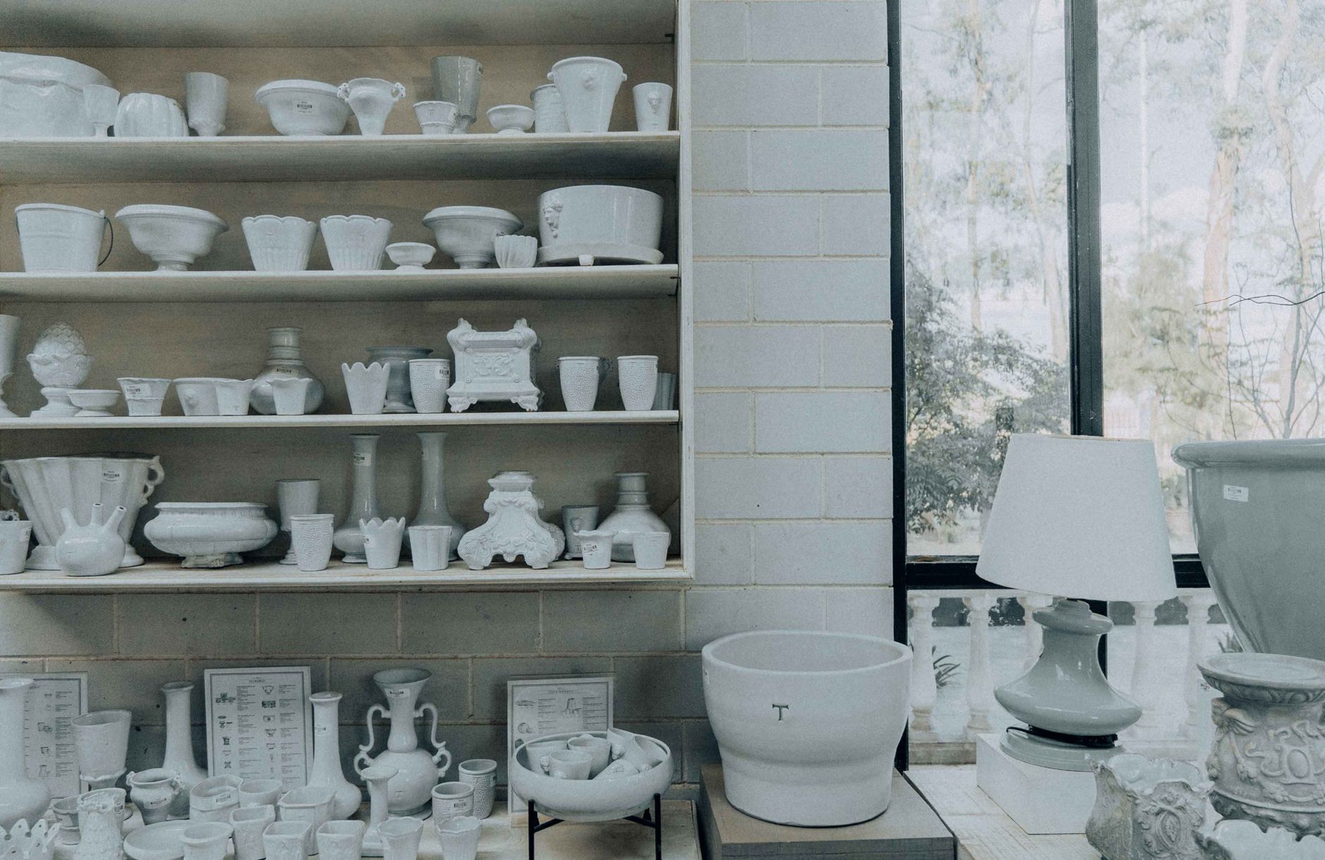 A collection of handmade ceramics in a crafts workshop